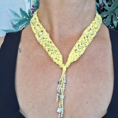 Yellow macrame necklace with silver stars