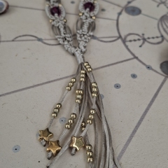 Silver grey macrame necklace with golden stars