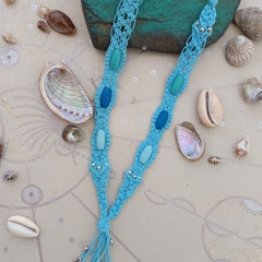 Baby blue macrame necklace with shell