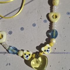 Yellow kids necklace with heart and teddy bears