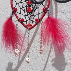 Small hanging gothic heart ornament with skulls