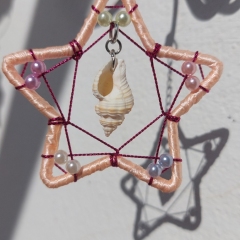 Small hanging star ornament with shell 