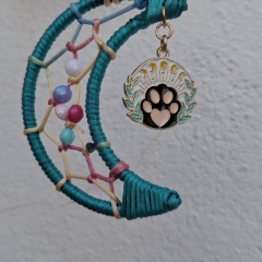 Small hanging moon ornament with paw print
